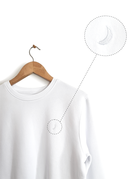 Ethical and sustainable, organic and recycled, white sweatshirt with embroidered crescent moon for yoga, gym, or lounge.