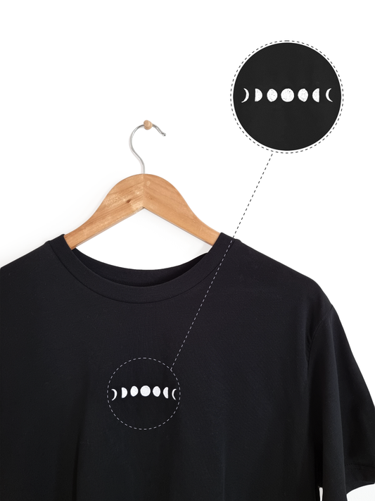 Ethical and sustainable, black organic cotton tee / t shirt with embroidered crescent moon, full moon, and phases of the moon design for yoga, gym, or lounge.