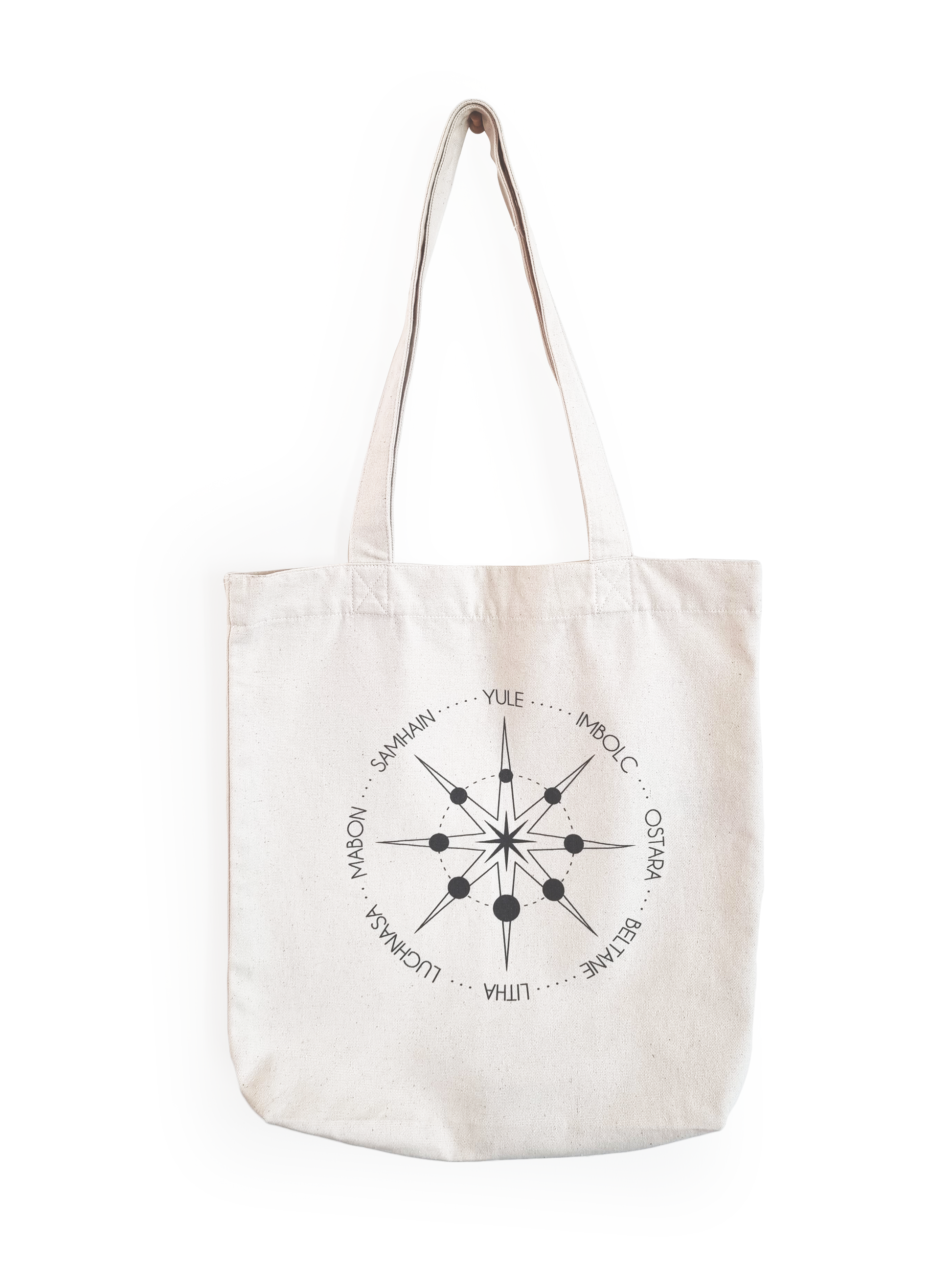 Ethical and sustainable, natural raw, organic and recycled tote bag / shopping bag / shopper with a printed witchy / pagan / wiccan / spiritual wheel of the year design for yoga, gym, or lounge wear.