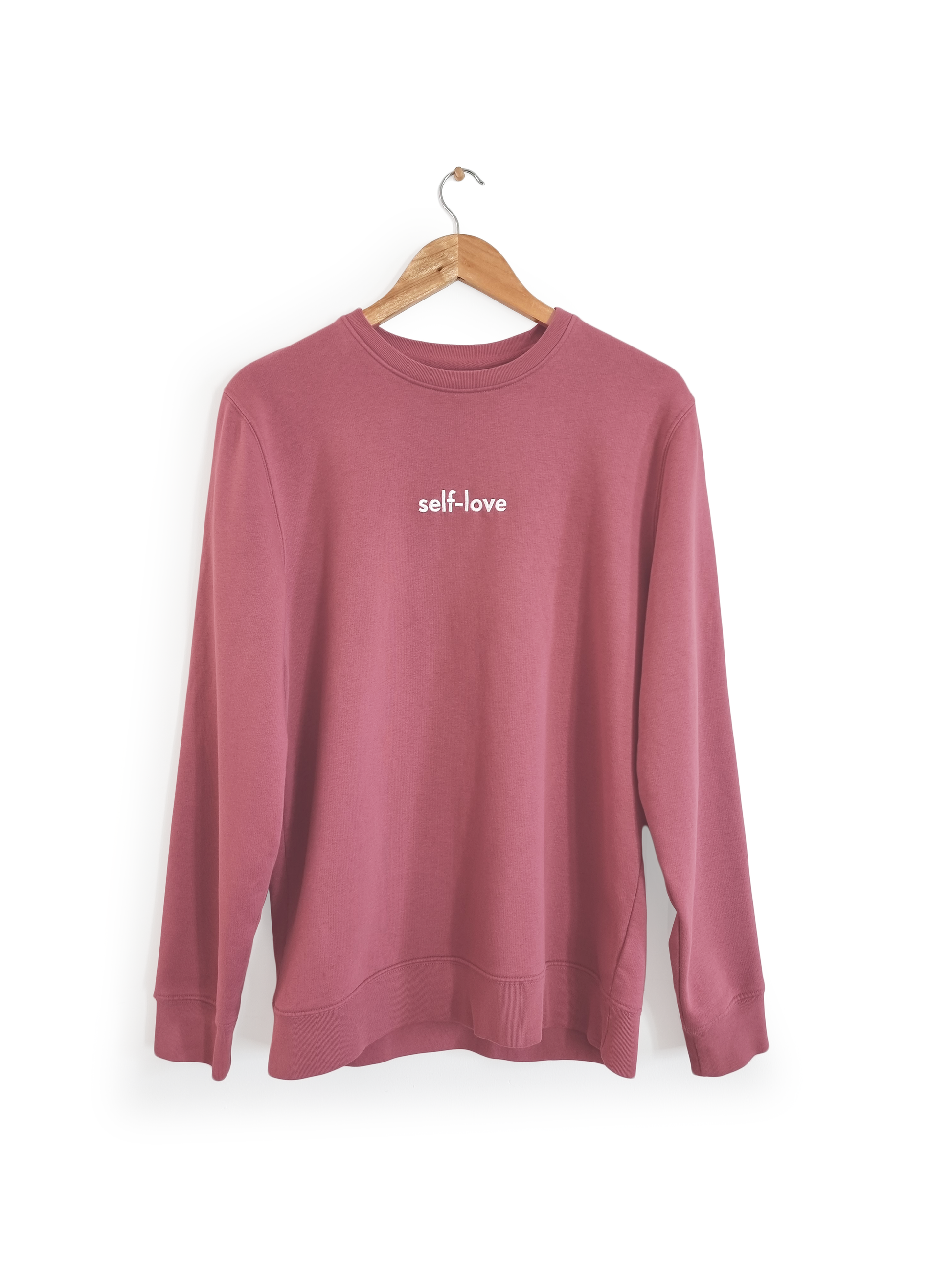 Ethical and sustainable, organic and recycled sweatshirt / sweater in mauve / pink / purple with embroidered self-love design for yoga, gym, or lounge wear.